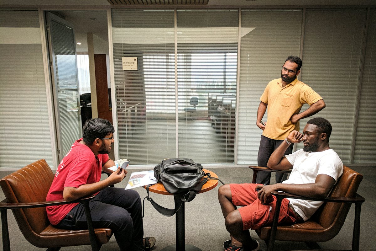 A bright shared workspace with people working